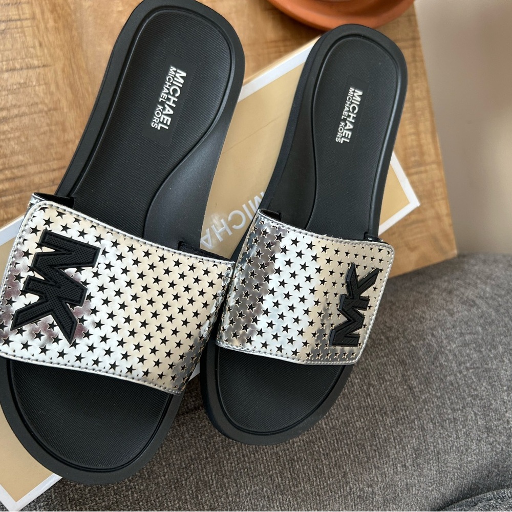 Michael Kors Silver and Black Slide Sandals with Bow Accents